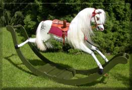 lovely bow rocker rocking horse